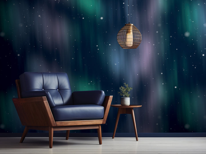 a blue leather armchair with a wooden side table and a hanging light fixture, set against a dark blue wall with a starry night sky background.
