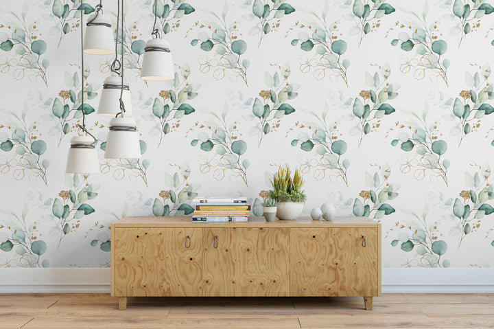 a wooden cabinet with a stack of books on top, set against a wall with a repeating floral pattern. The cabinet is positioned in front of a hanging light fixture, creating a cozy and inviting atmosphere.