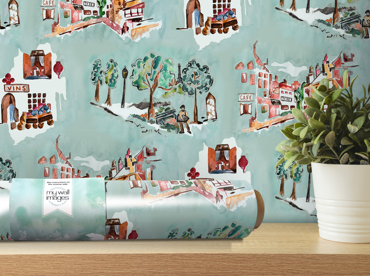 a wall with a watercolor-style wallpaper pattern depicting various scenes, including people, buildings, and trees. There is also a potted plant in the foreground, adding a touch of greenery to the scene.