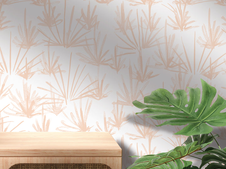a wooden table with a plant on top of it, set against a wall with a patterned wallpaper.