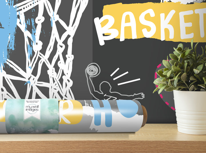 a basketball-themed poster with a basketball net and a potted plant on a shelf.