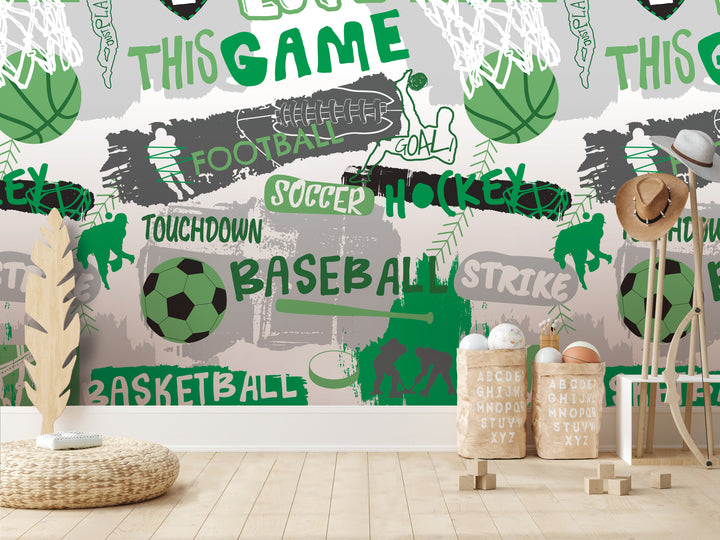 a wall with a collage of various sports-related images, including a basketball, soccer ball, and baseball, along with the words "TOUCHDOWN", "SOCcer", "HOCKEY", "BASEBALL", and "STRIKE". There are also some baskets and a hat in the foreground.