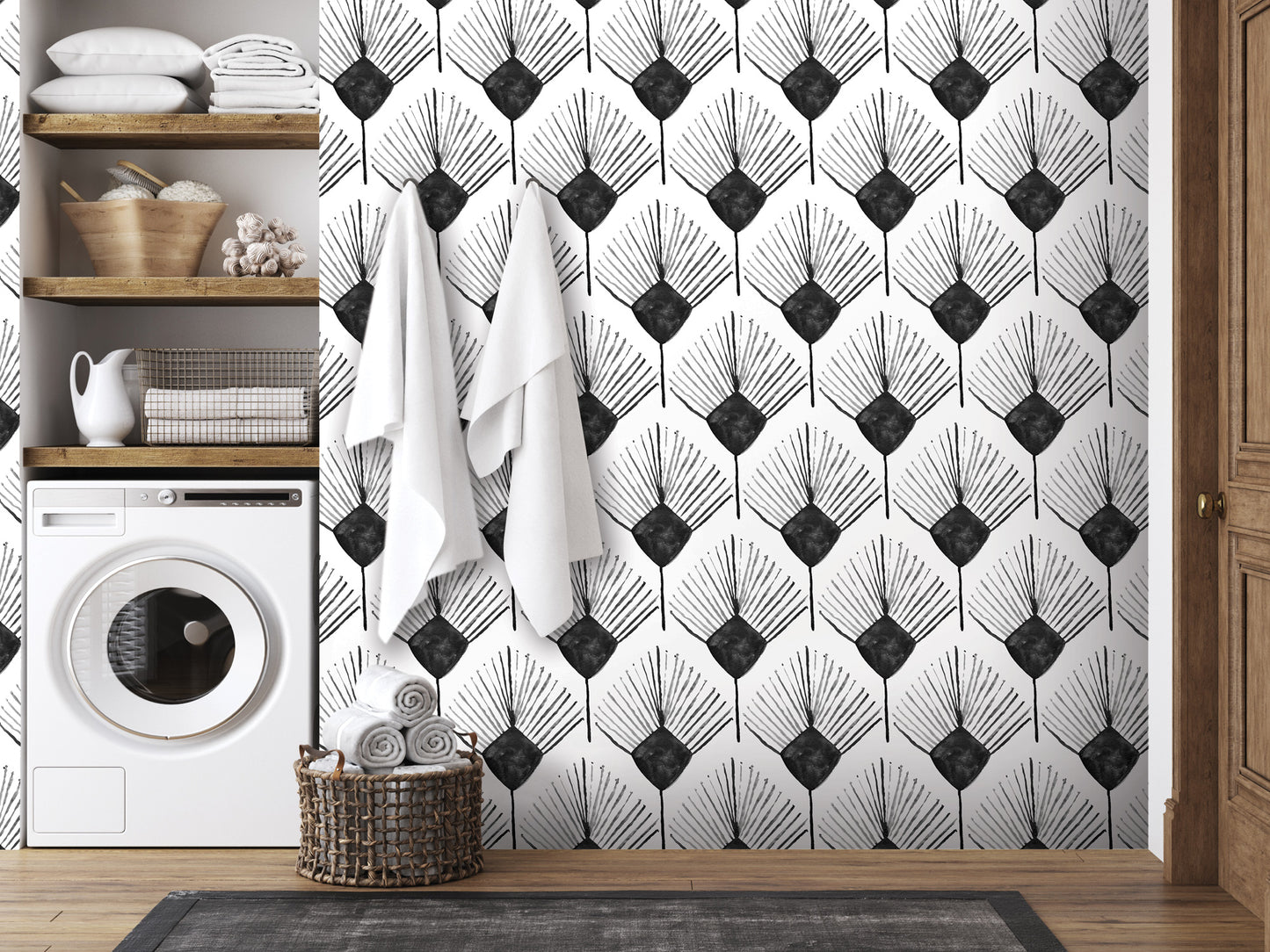 a bathroom with a black and white patterned wallpaper, a washing machine, and a basket of towels.