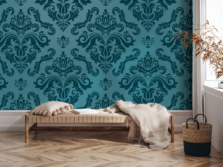 a modern living room with a blue and white patterned wallpaper, a wooden bench with a white pillow, and a woven basket on the floor.