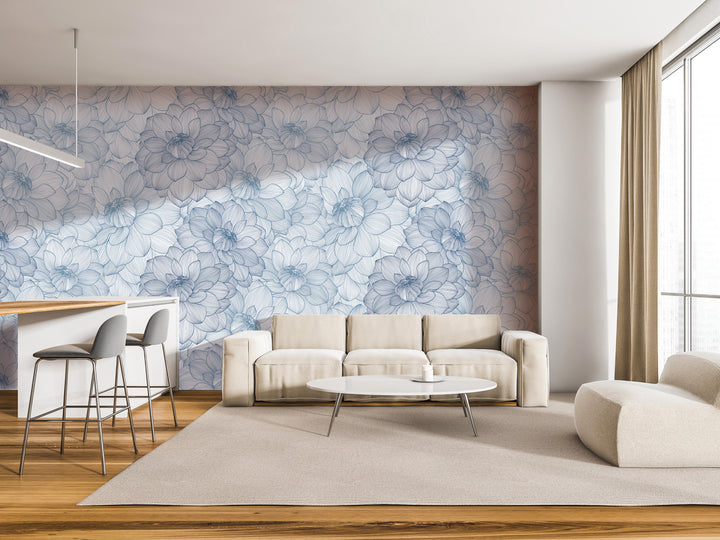 a modern living room with a large floral wallpaper on the wall, a white sofa, a round coffee table, and a barstool.