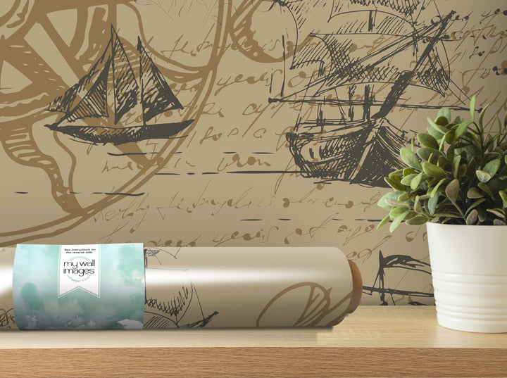 a wall with a large, intricate drawing of a ship, a potted plant, and a roll of wallpaper with a watercolor-like design.