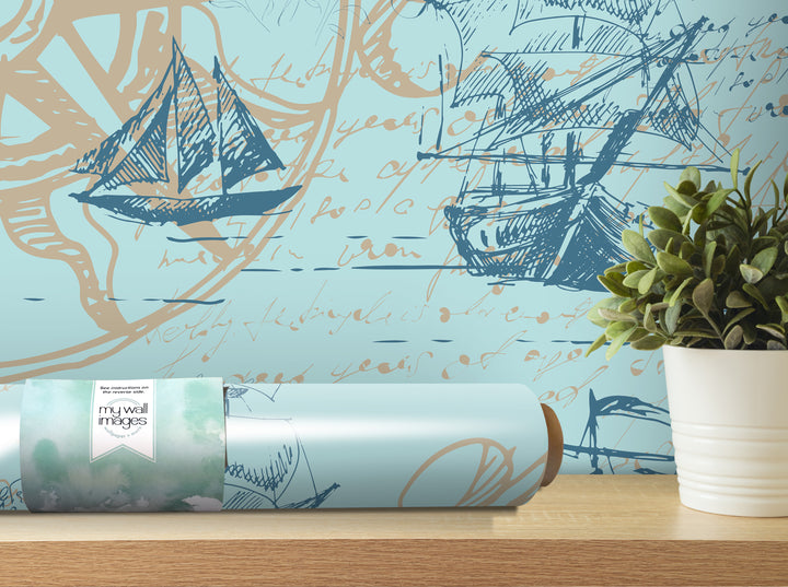 a wall with a blue and white sailboat design, along with some handwritten text and a potted plant on a shelf.