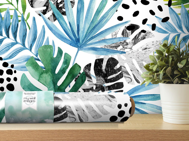 a tube of toothpaste next to a potted plant