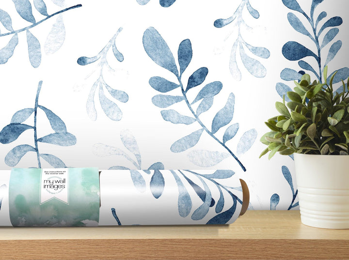 a plant is sitting on a shelf next to a wallpaper