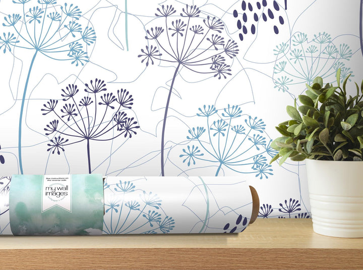 a vase with a plant in it on a table