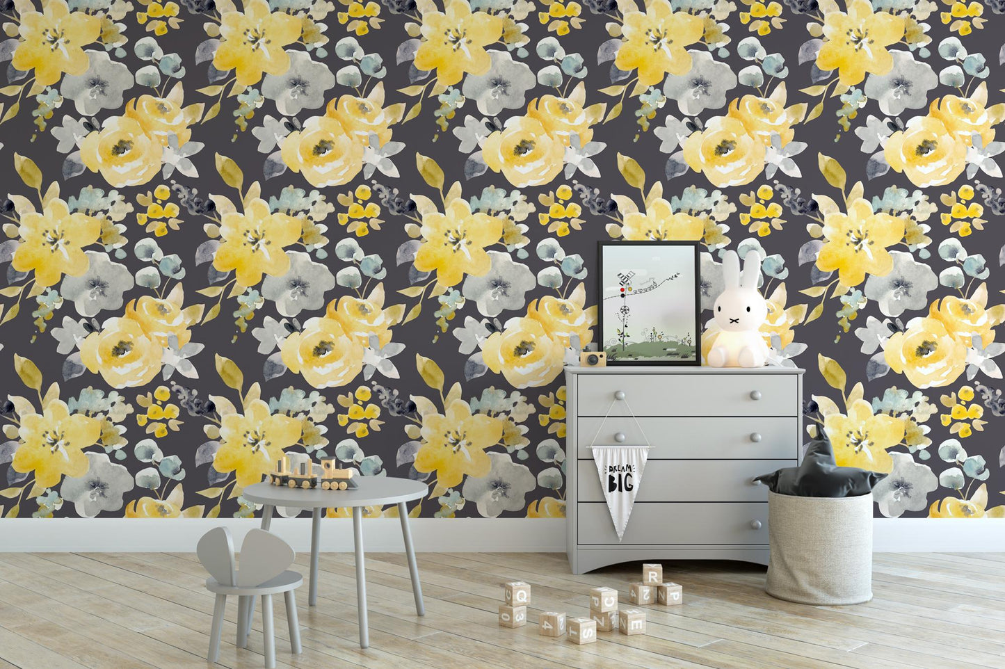 a room with a dresser and a flower wallpaper