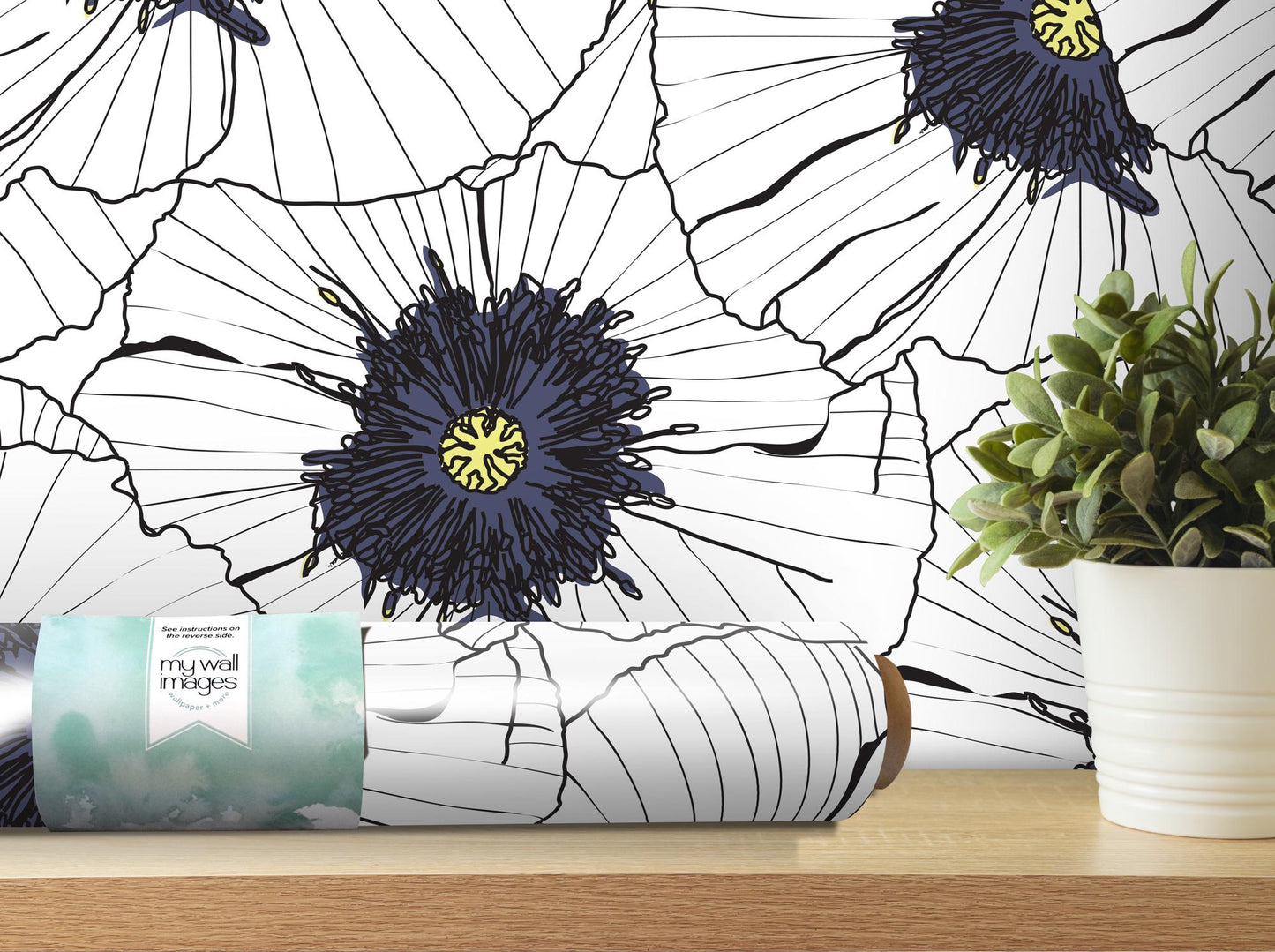 a white vase with a plant and a blue flower on a shelf