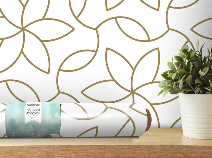 a vase with a plant on a table