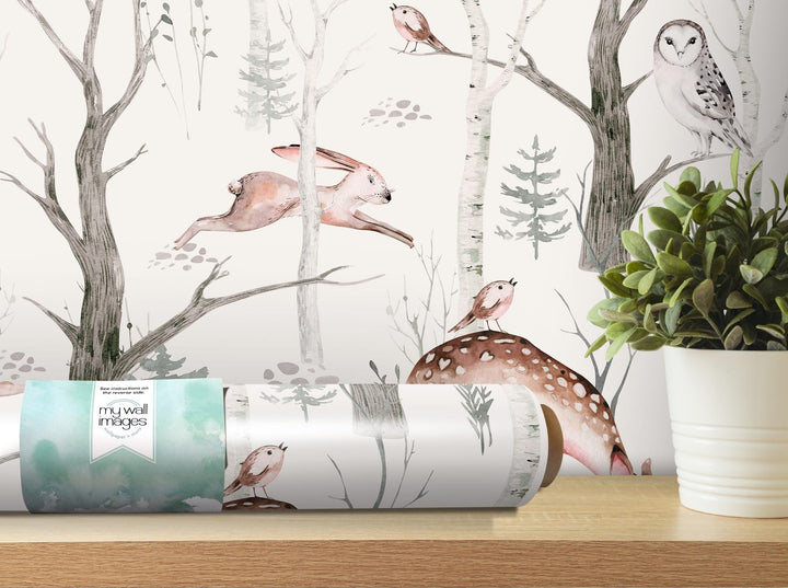 a wallpaper with deer and birds on it