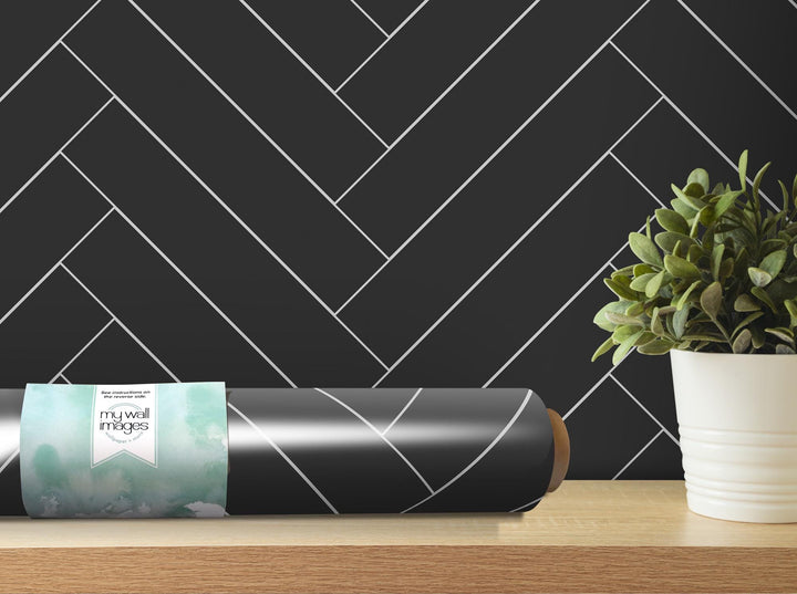 a vase with a potted plant on a table