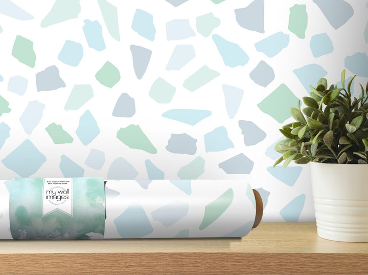 a potted plant sitting on top of a wooden table