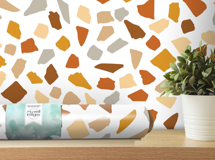 a potted plant sitting on top of a wooden table