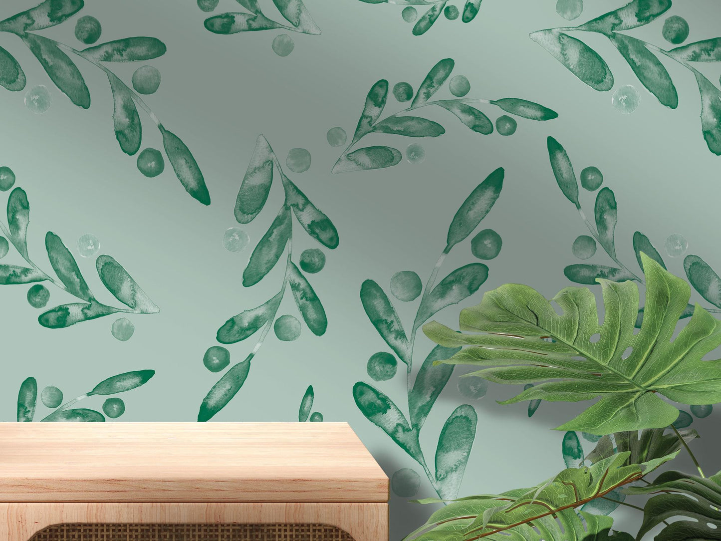 a green plant is next to a blue wall