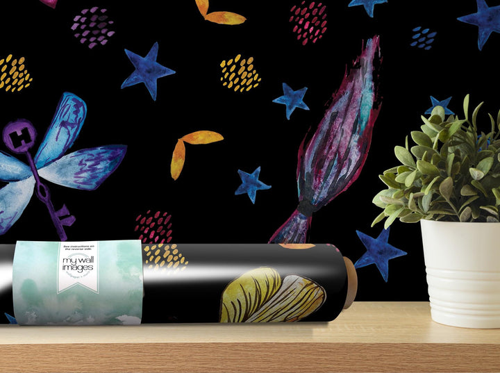 a vase with a plant on a table next to a wallpaper