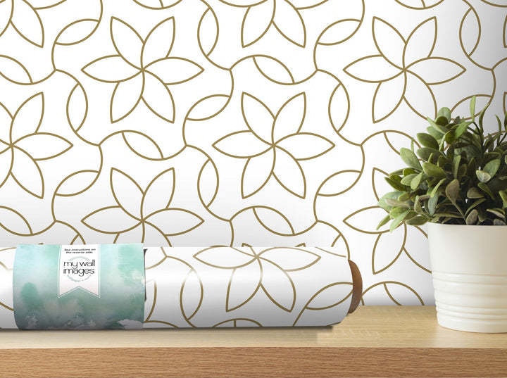 a vase with a potted plant on a table