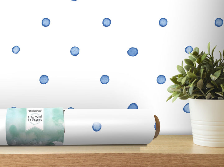 a potted plant sitting on top of a wooden table