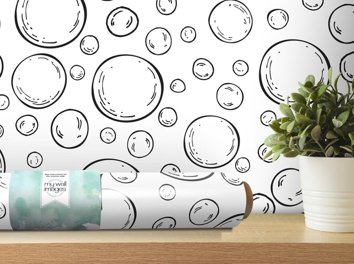 a potted plant sitting on top of a wooden table