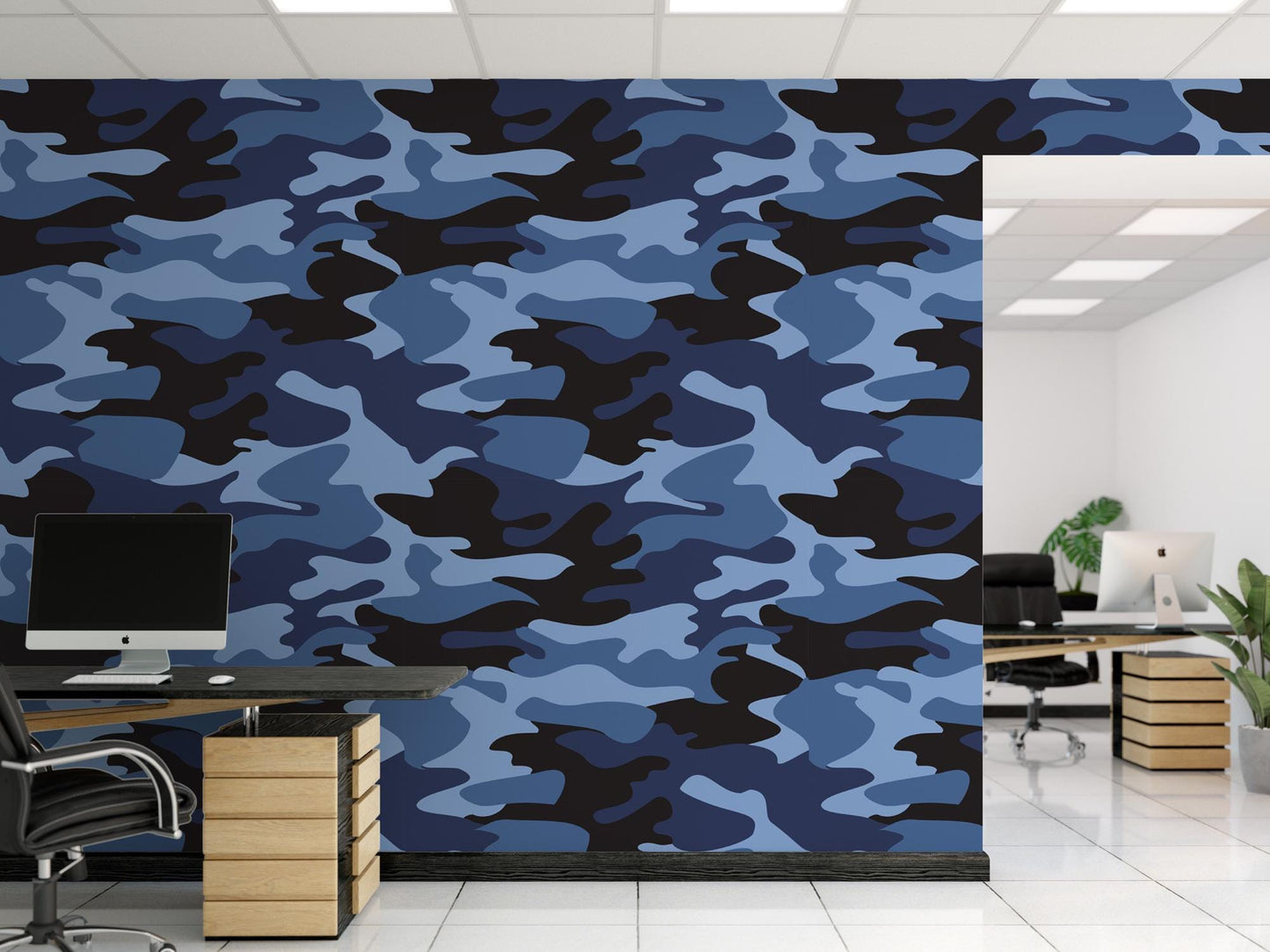 an office with a blue camouflage wallpaper