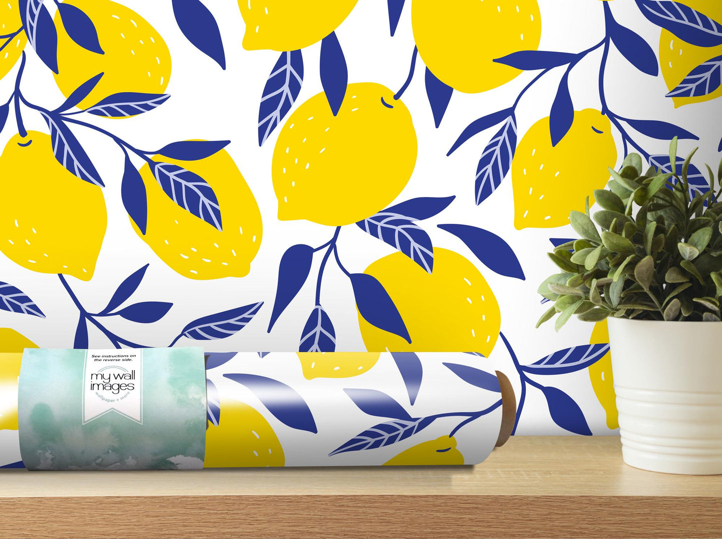 a yellow and blue wallpaper with lemons on it