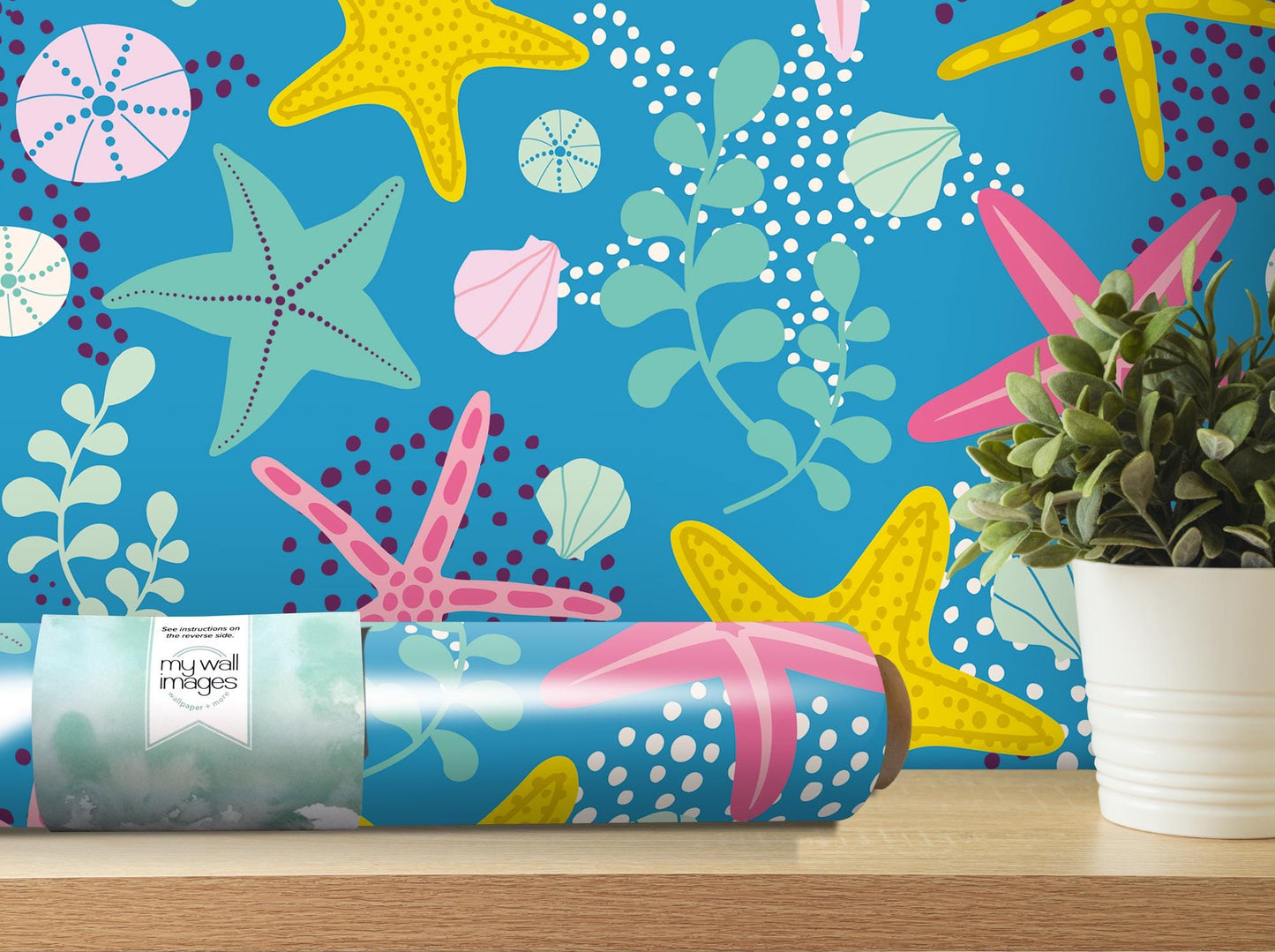 a vase with a plant in it next to a wallpaper