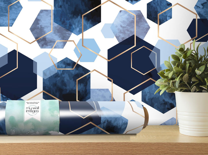 a vase with a plant in it next to a wallpaper