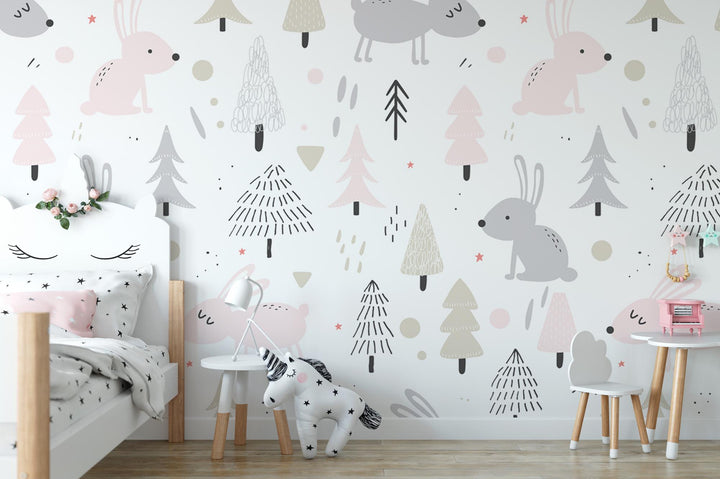 a child's room with a bed, desk, and wallpaper