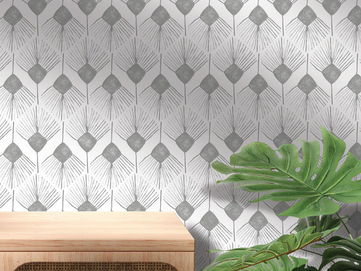 a wooden table sitting next to a green plant