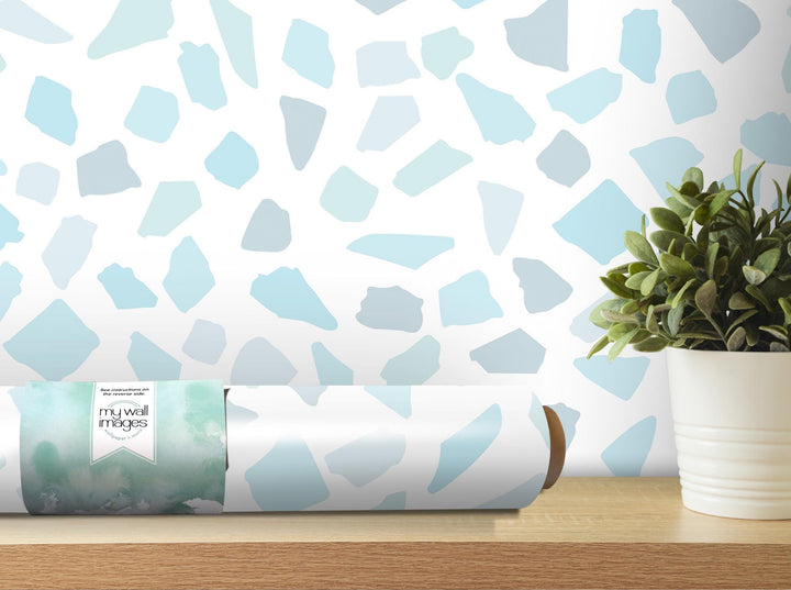 a potted plant sitting on top of a wooden table