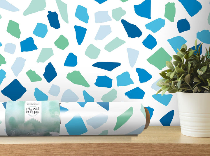 a potted plant sitting on top of a wooden table