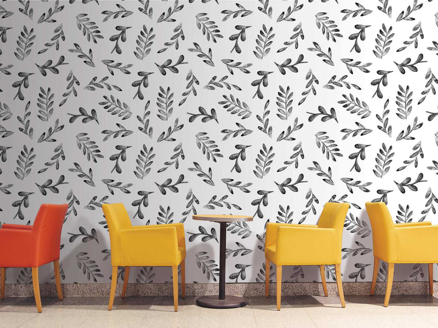 three chairs and a table in front of a wall