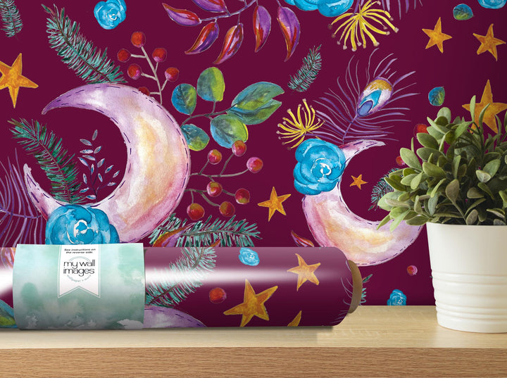 a gift wrapped in a wrapping paper with a painting of a crescent and stars
