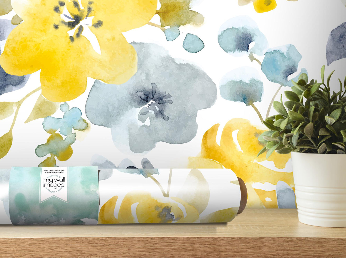 a painting of flowers on a wall next to a potted plant