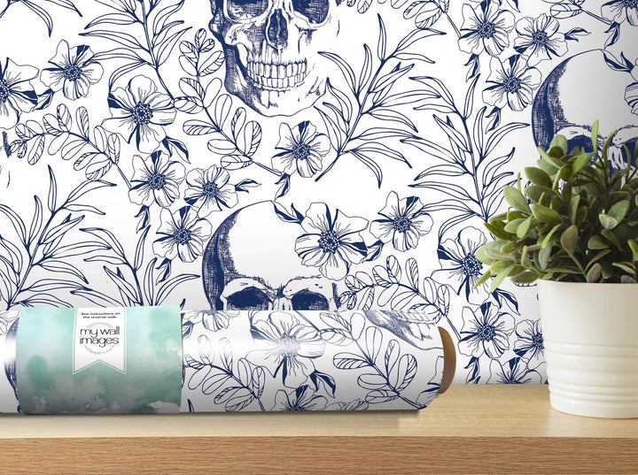 a wallpaper with a skull and flowers on it