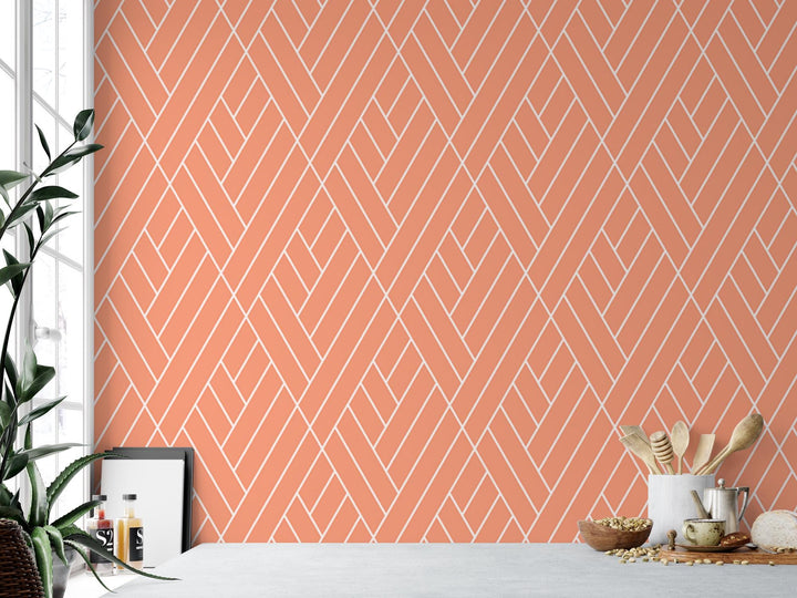 a table with a potted plant next to a wall