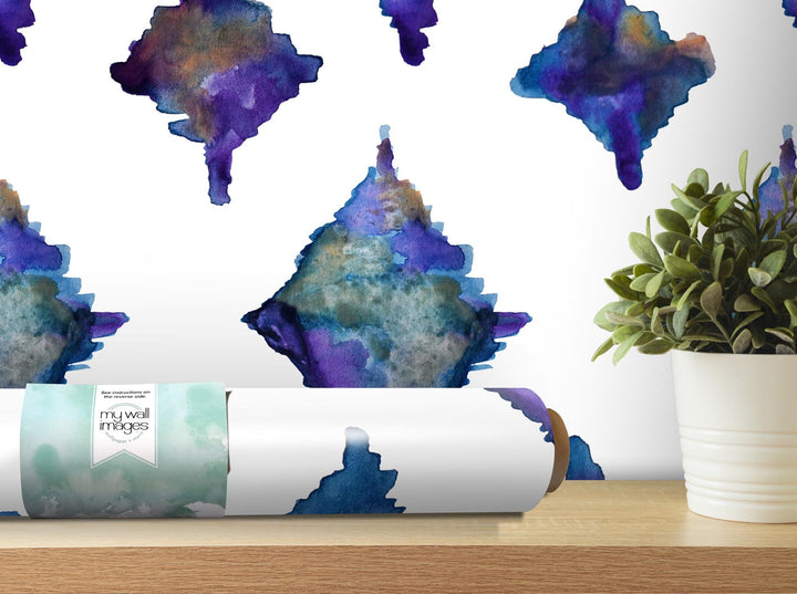 a painting of blue and purple shapes on a wall