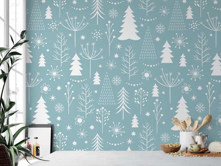 a kitchen counter with a potted plant next to it