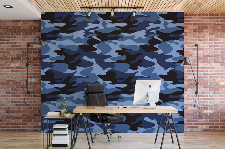 a desk with a computer on top of it