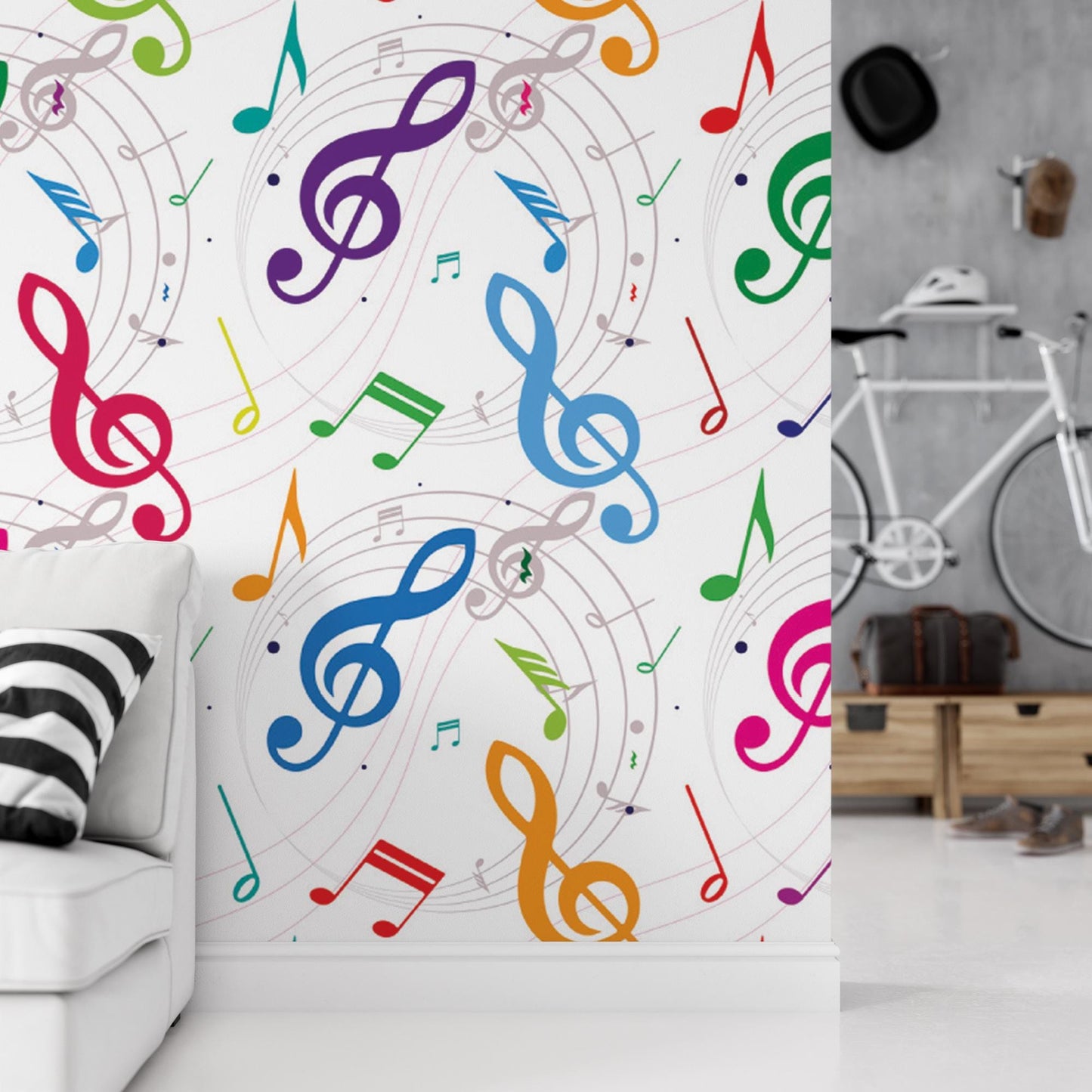 a room with a white couch and a wall with musical notes on it