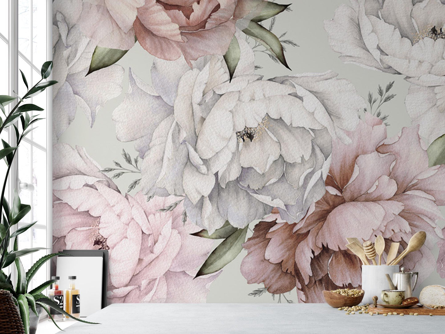 a white table topped with a vase filled with flowers