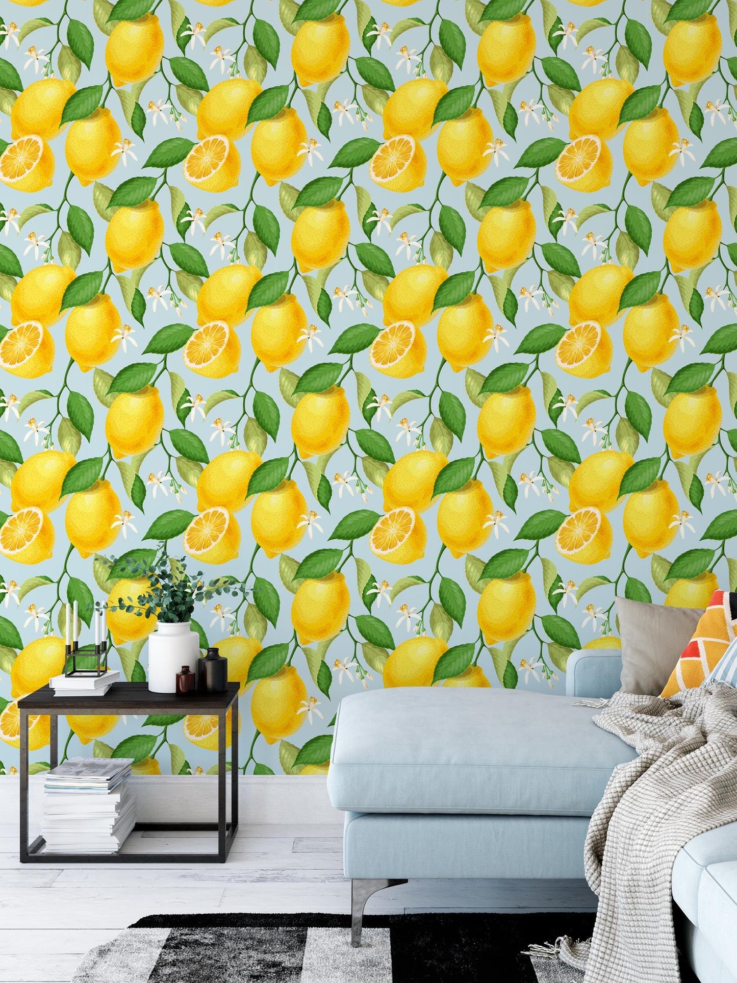 a living room with a couch and a wallpaper with lemons