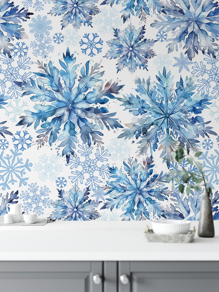 a white table topped with a vase filled with flowers