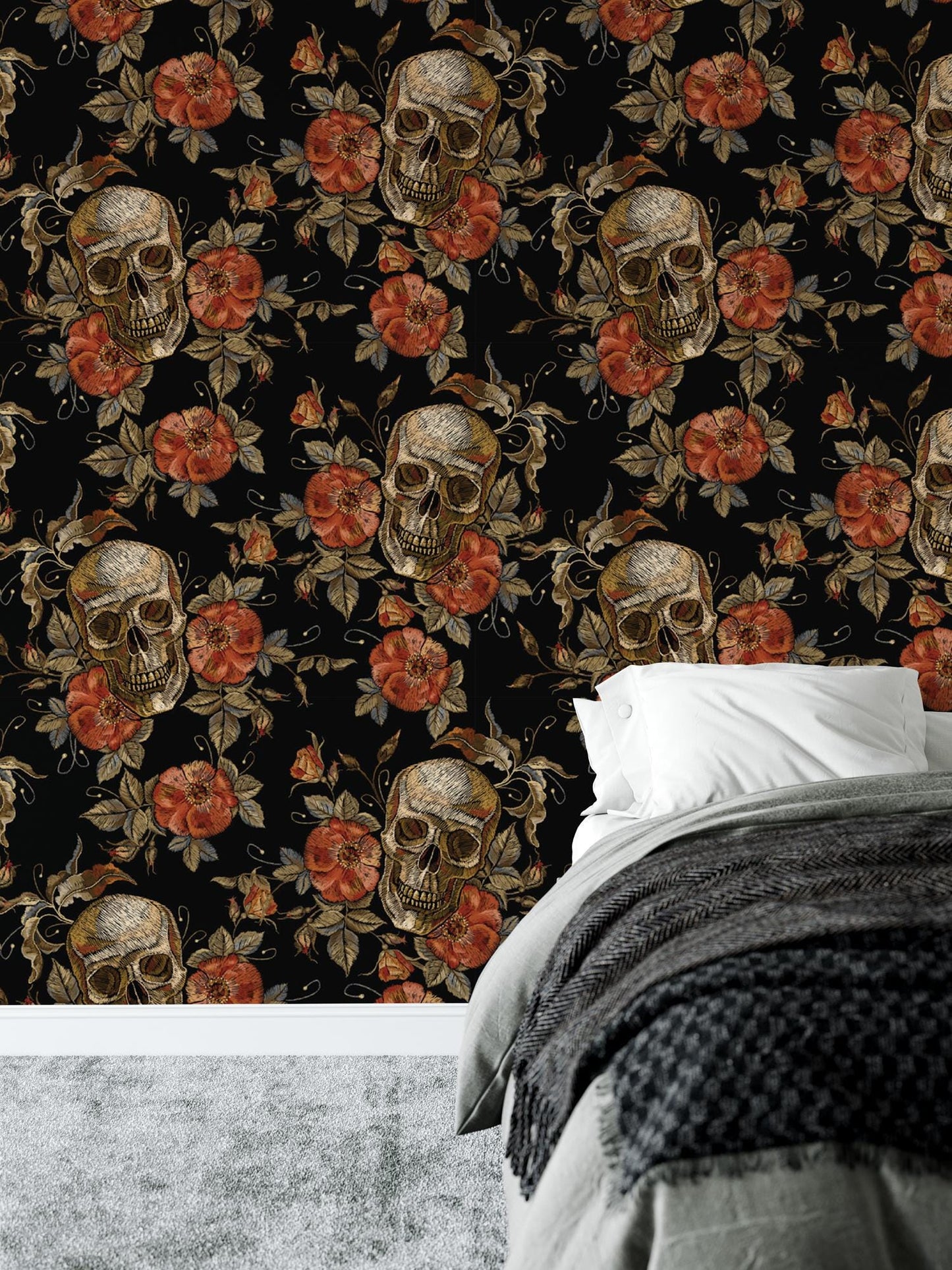 a bedroom with a skull and roses wallpaper