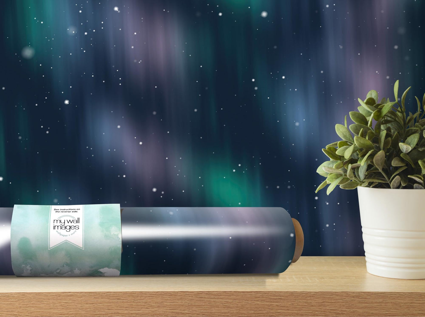 a roll of wrapping paper next to a potted plant