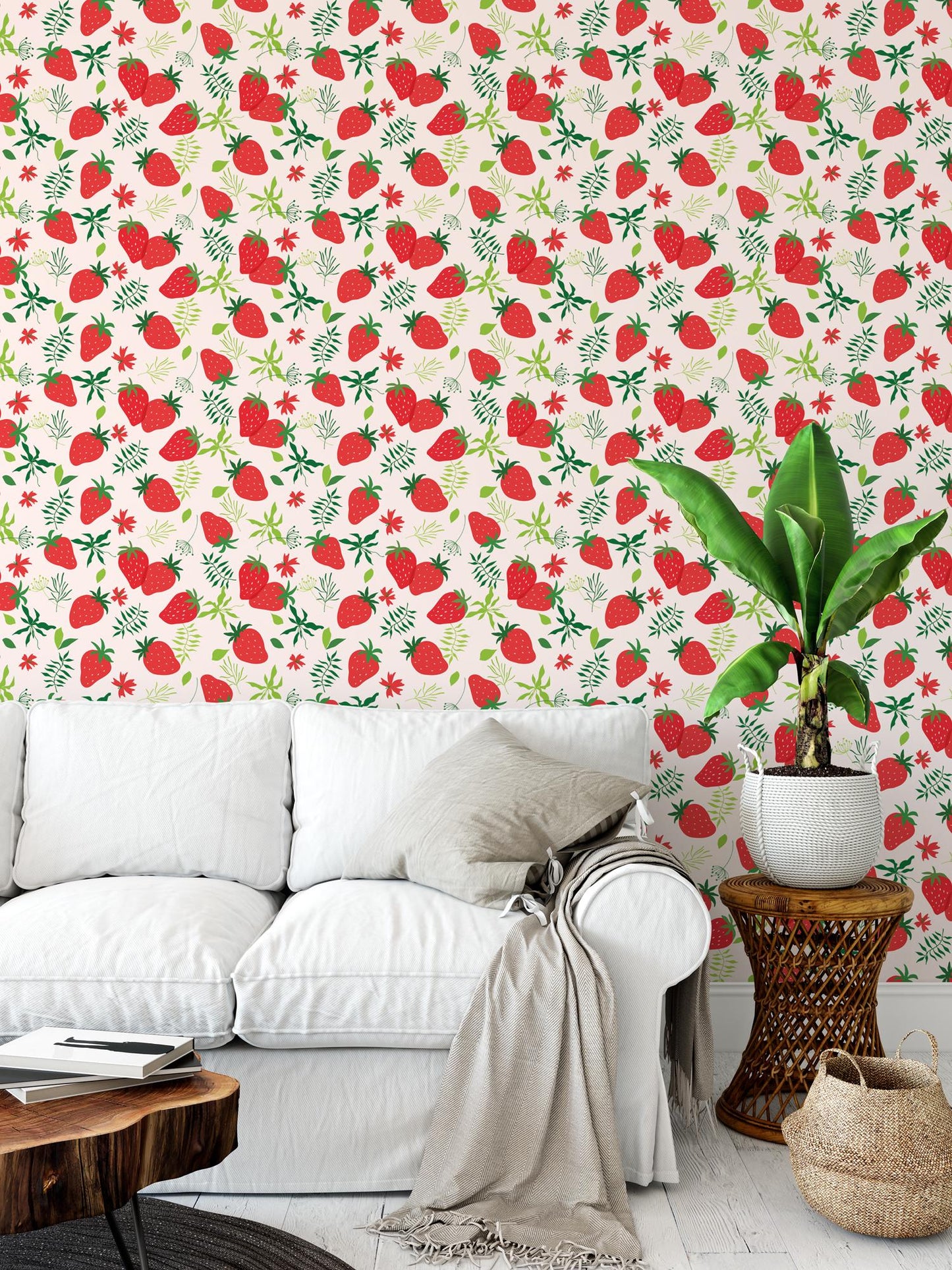 a living room with a white couch and a potted plant