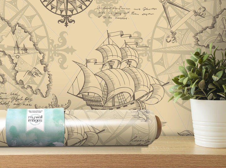 a roll of wrapping paper sitting next to a potted plant